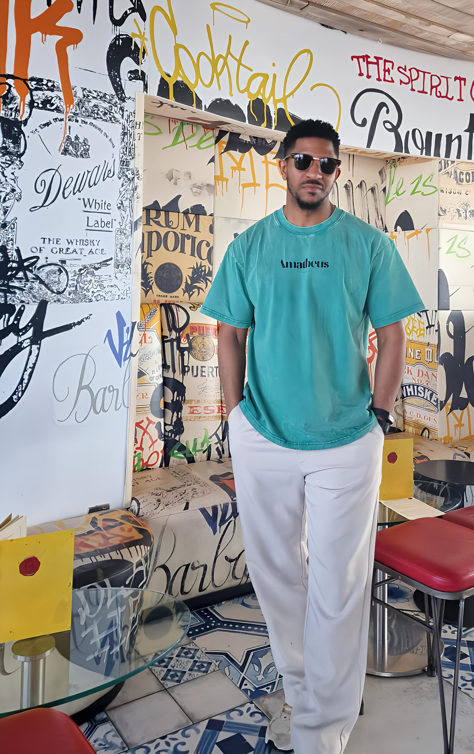 Man wearing Amatheus Azure oversized t-shirt in a modern streetwear setting